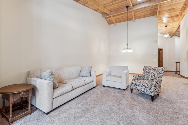 carpeted living room with wood ceiling, beamed ceiling, and a high ceiling