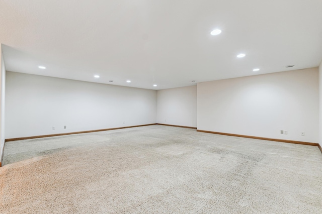 empty room with light colored carpet