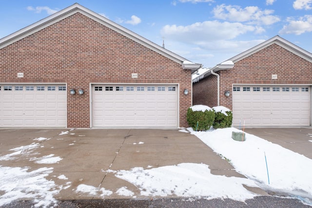 front facade with a garage