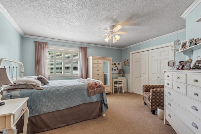 bedroom with ceiling fan, ornamental molding, light carpet, and a closet