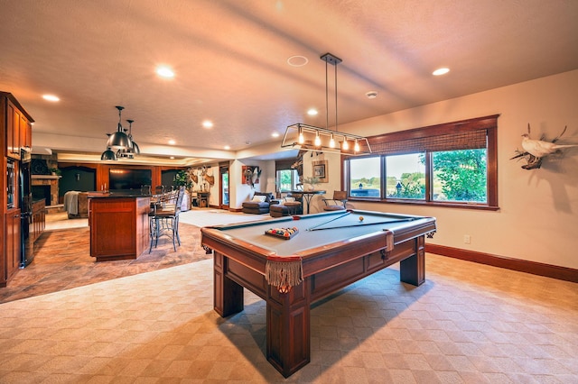 game room with light carpet, a fireplace, and billiards