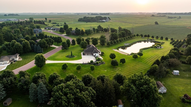 birds eye view of property featuring a rural view