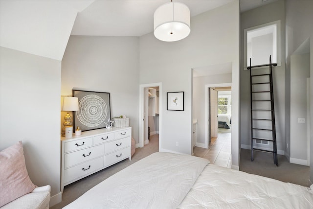 carpeted bedroom featuring vaulted ceiling