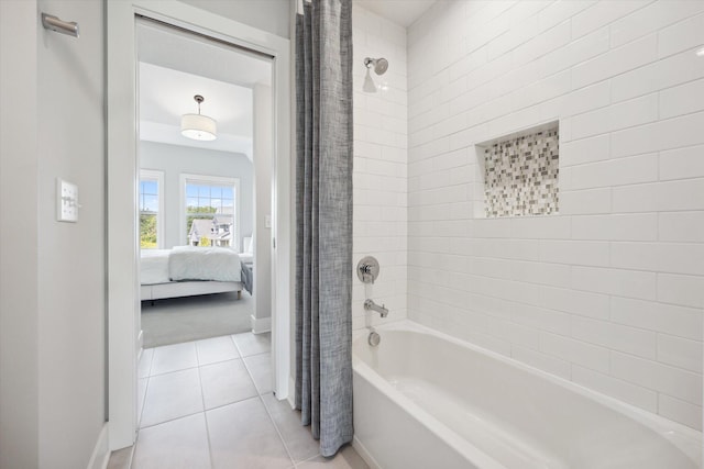 bathroom with shower / tub combo with curtain and tile patterned flooring