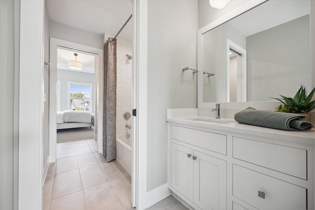 bathroom with vanity, tile patterned floors, and shower / tub combo