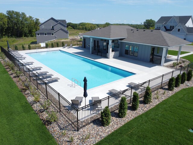 community pool with a patio