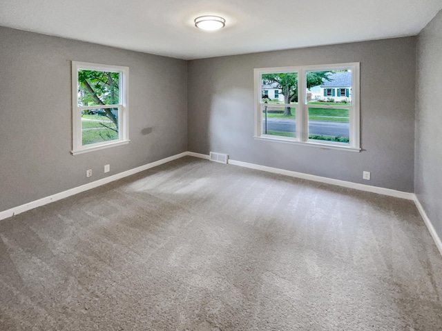 view of carpeted spare room