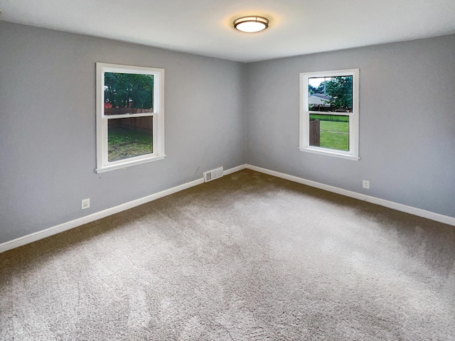 empty room with carpet floors