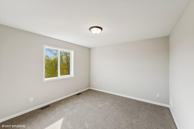 view of carpeted spare room