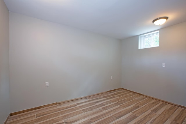 unfurnished room featuring light hardwood / wood-style flooring