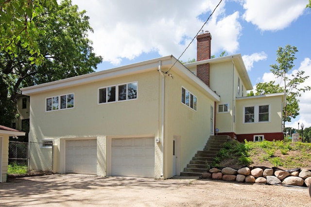 exterior space with a garage