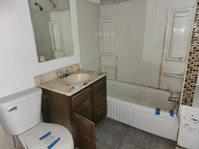 full bathroom with vanity, toilet, and washtub / shower combination