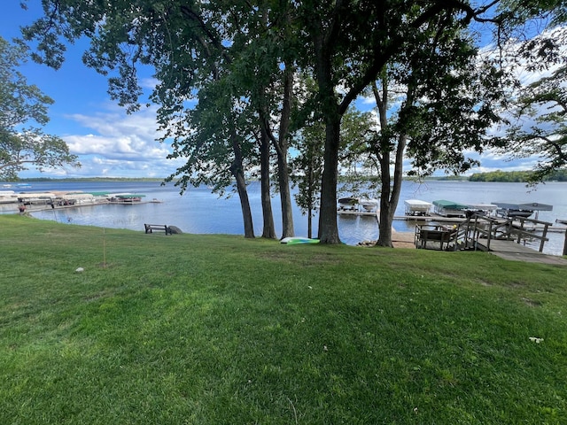 25683 Circle Dr, Garrison Twp, MN 56401 - dock area featuring a water view and a lawn