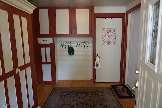 doorway to outside with light wood-style floors