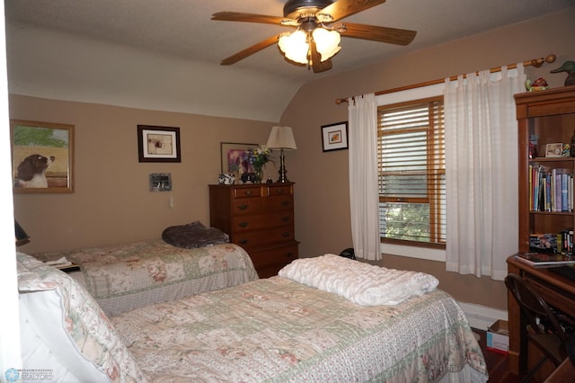 bedroom with vaulted ceiling and ceiling fan