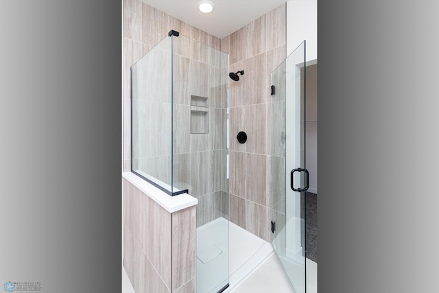 bathroom with walk in shower