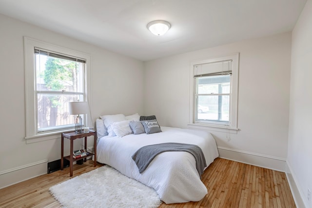 bedroom featuring light wood-type flooring