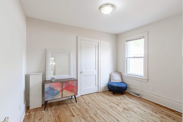 bedroom with light wood-type flooring