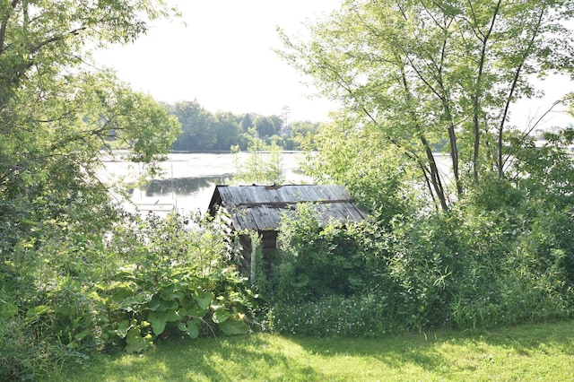 205 2nd Ave SE, Baudette, MN 56623 - view of yard featuring a boat dock