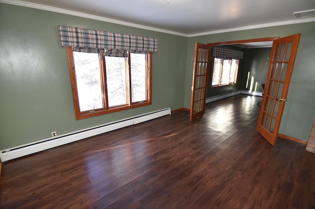 205 2nd Ave SE, Baudette, MN 56623 - spare room featuring a baseboard radiator, ornamental molding, wood finished floors, and french doors