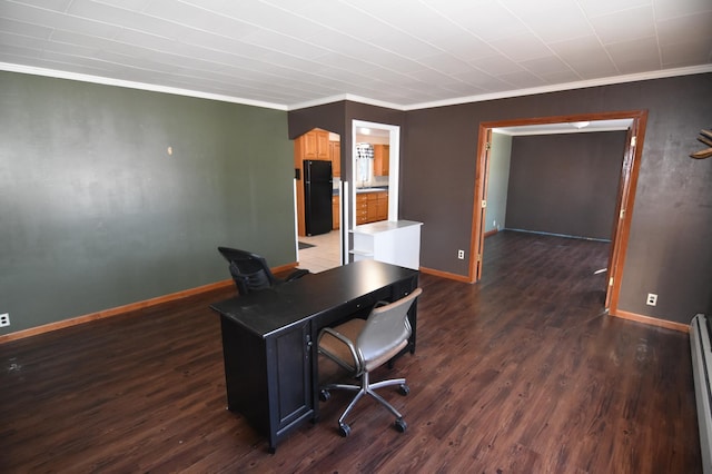 205 2nd Ave SE, Baudette, MN 56623 - home office featuring crown molding, dark wood-style floors, and a baseboard heating unit
