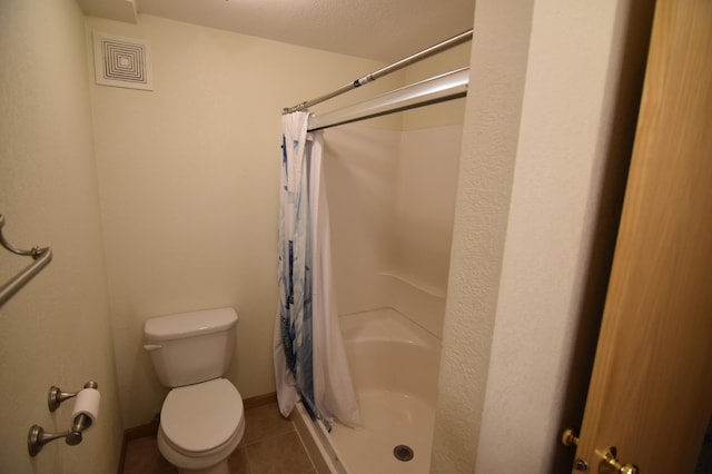 205 2nd Ave SE, Baudette, MN 56623 - full bath with a shower with shower curtain and tile patterned flooring