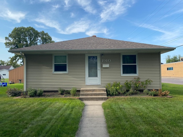 bungalow with a front lawn