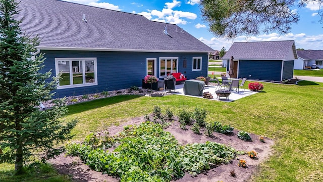 back of property featuring an outdoor hangout area, a yard, a patio area, and an outdoor structure