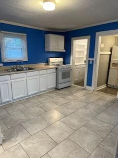 kitchen featuring white appliances, sink, crown molding, and white cabinets