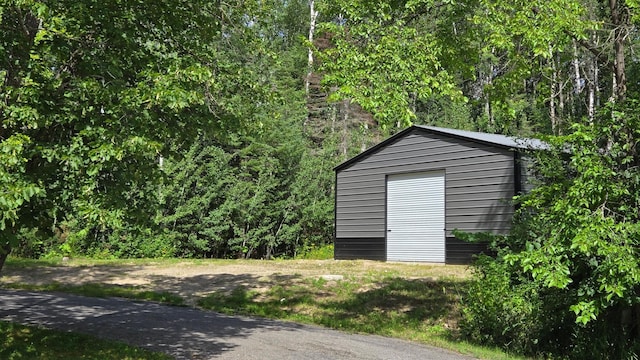 view of outdoor structure featuring a garage