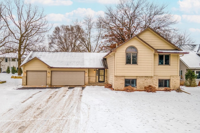 split level home featuring a garage