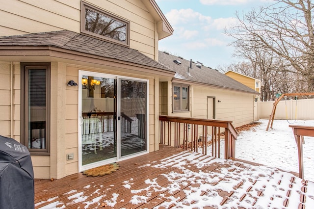 snow covered deck featuring grilling area