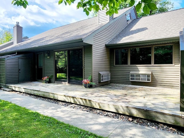 rear view of house with a deck