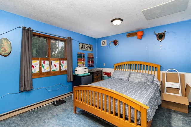 carpeted bedroom with a textured ceiling and baseboard heating