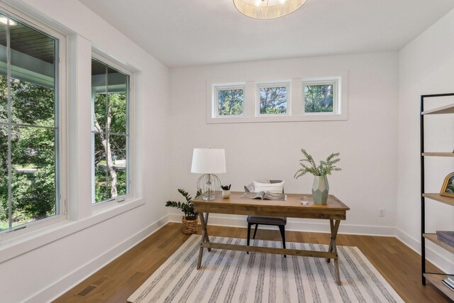 office area with dark hardwood / wood-style flooring