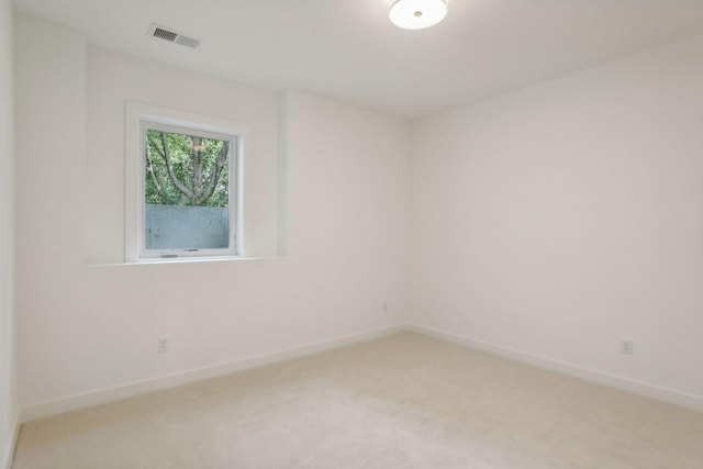 empty room featuring carpet floors