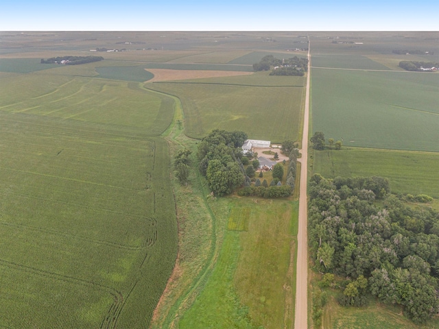 birds eye view of property with a rural view