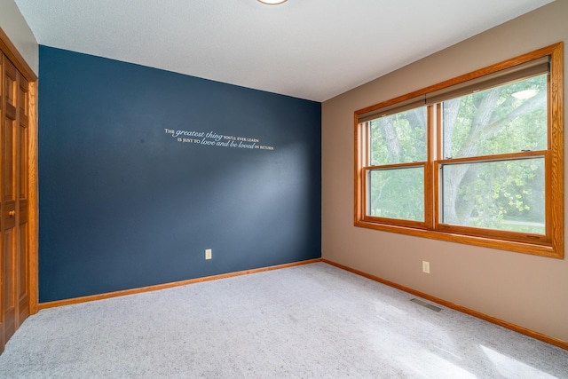 view of carpeted spare room