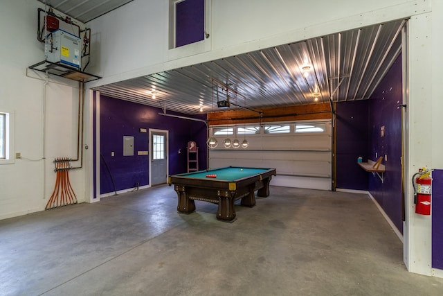 recreation room with billiards and concrete floors