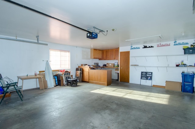 garage featuring a garage door opener