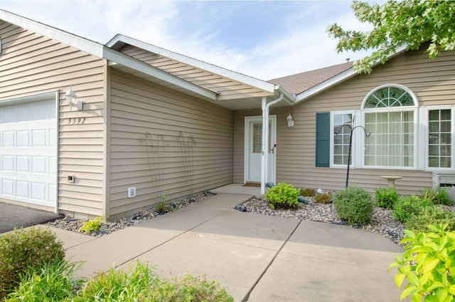 entrance to property with a garage