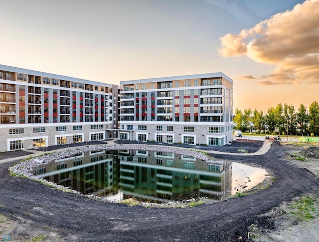 view of outdoor building at dusk