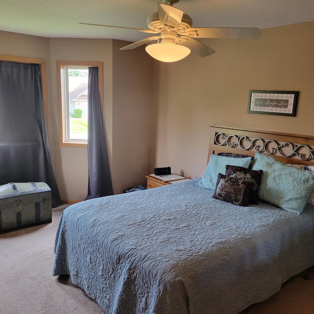 bedroom featuring carpet and ceiling fan