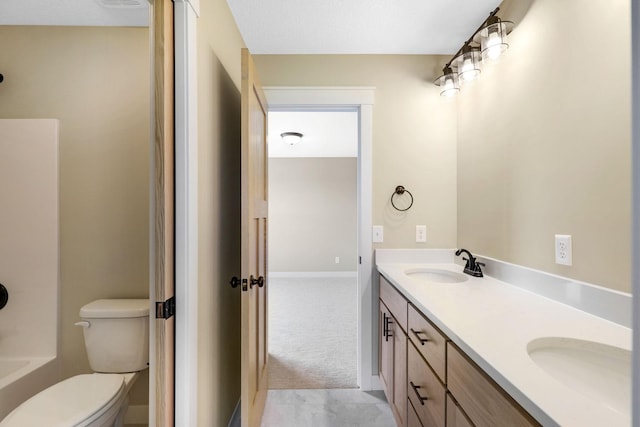 full bathroom featuring tile patterned floors, shower / bath combination, toilet, and vanity