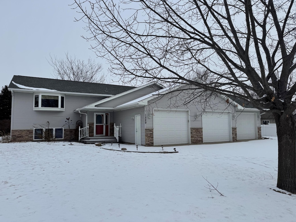 tri-level home with an attached garage