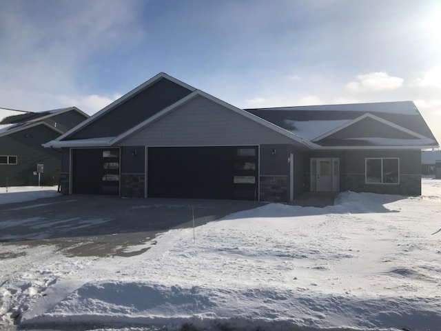 ranch-style home with a garage