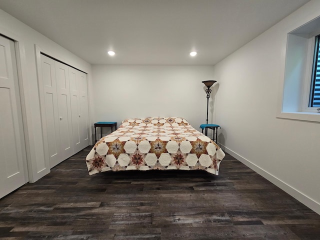 bedroom featuring dark hardwood / wood-style floors