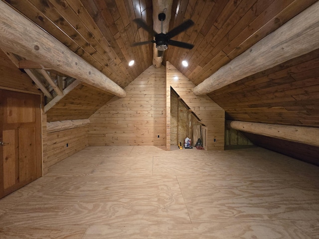 bonus room with lofted ceiling, wooden walls, and wooden ceiling