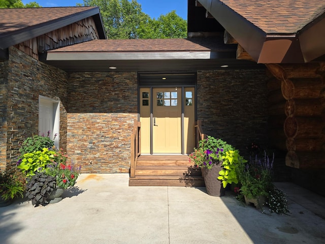 doorway to property featuring a patio