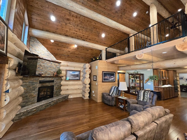 living room featuring a stone fireplace, beam ceiling, dark wood-type flooring, wooden ceiling, and high vaulted ceiling